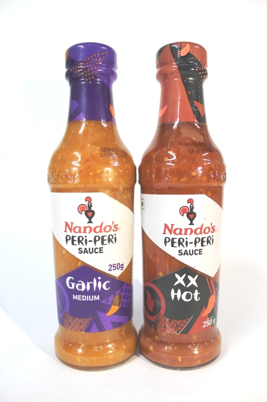 Nando's Peri Peri Sauce Garlic+Xx Hot (1 Each) 250 Gms - Grocery Gram